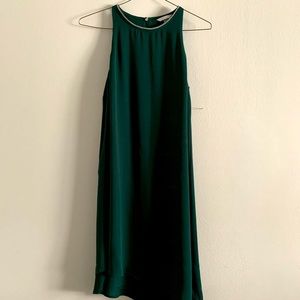Dark emerald green dress.